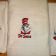 White towels embroidered with lovely Dr. Seuss heroes