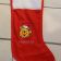 Winnie Pooh in santa hat embroidered on red Christmas sock