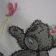 Teddy bear with butterfly embroidered on bib