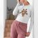 sublimated long sleeve tee with giraffe embroidery design woman hallway