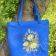 Blue bag with bouguet embroidery design