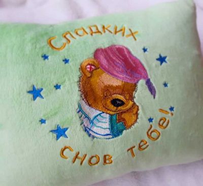 Embroidered cushion with teddy bear old toys design